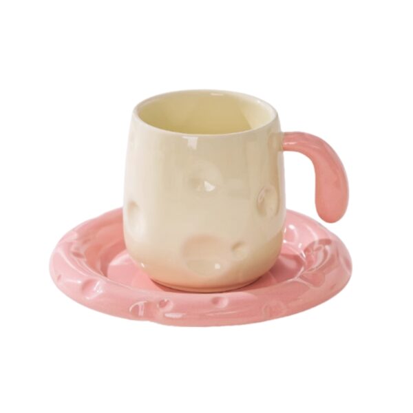 Hand Painted Ceramic Tea Cup And Saucer Set, Pink And White Design - Image 1